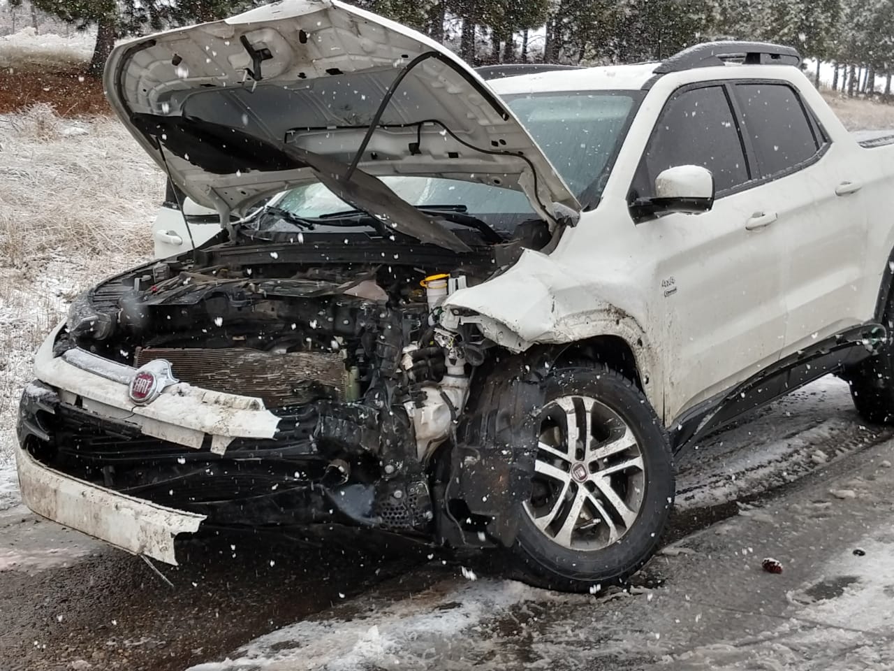 Choque frontal bajo la nieve en la ruta 259